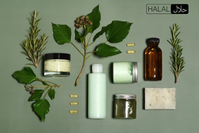 A group of skincare products with leaves.