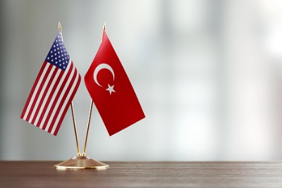 USA and Turkish flags.